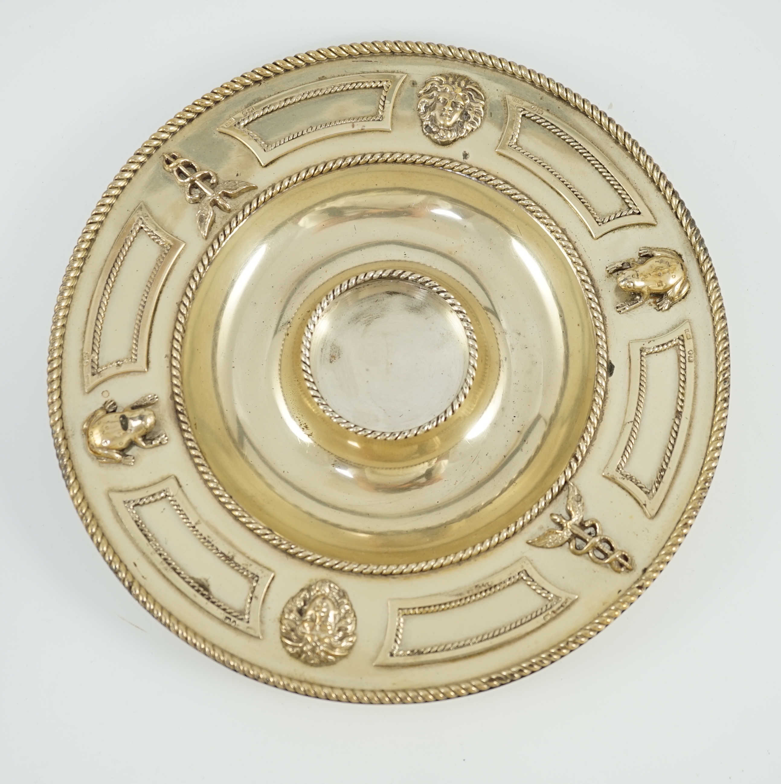 A Victorian silver gilt circular inkstand, by Robert Hennell III